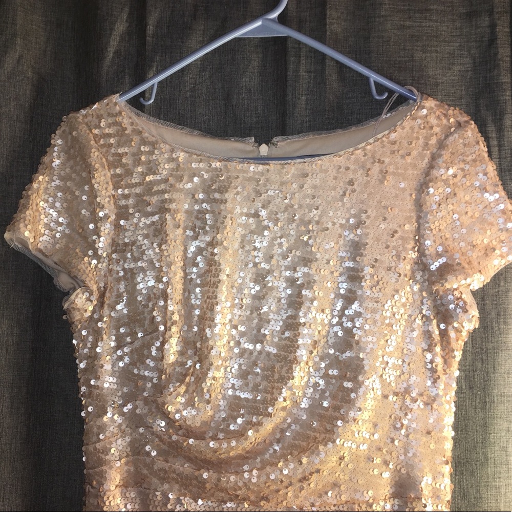 Sequined floor-length gown in champagne.